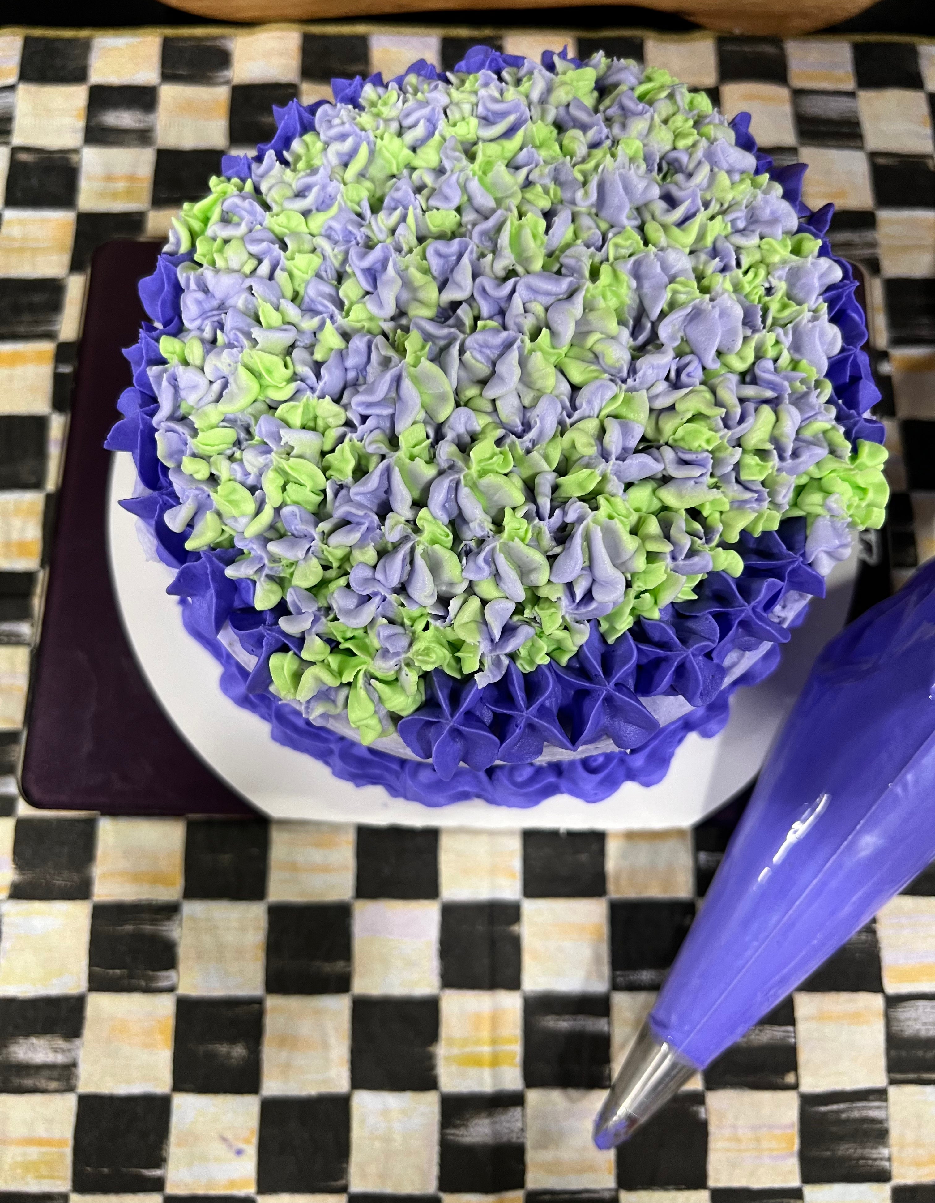 Vanilla cake with purple frosting 9 inch